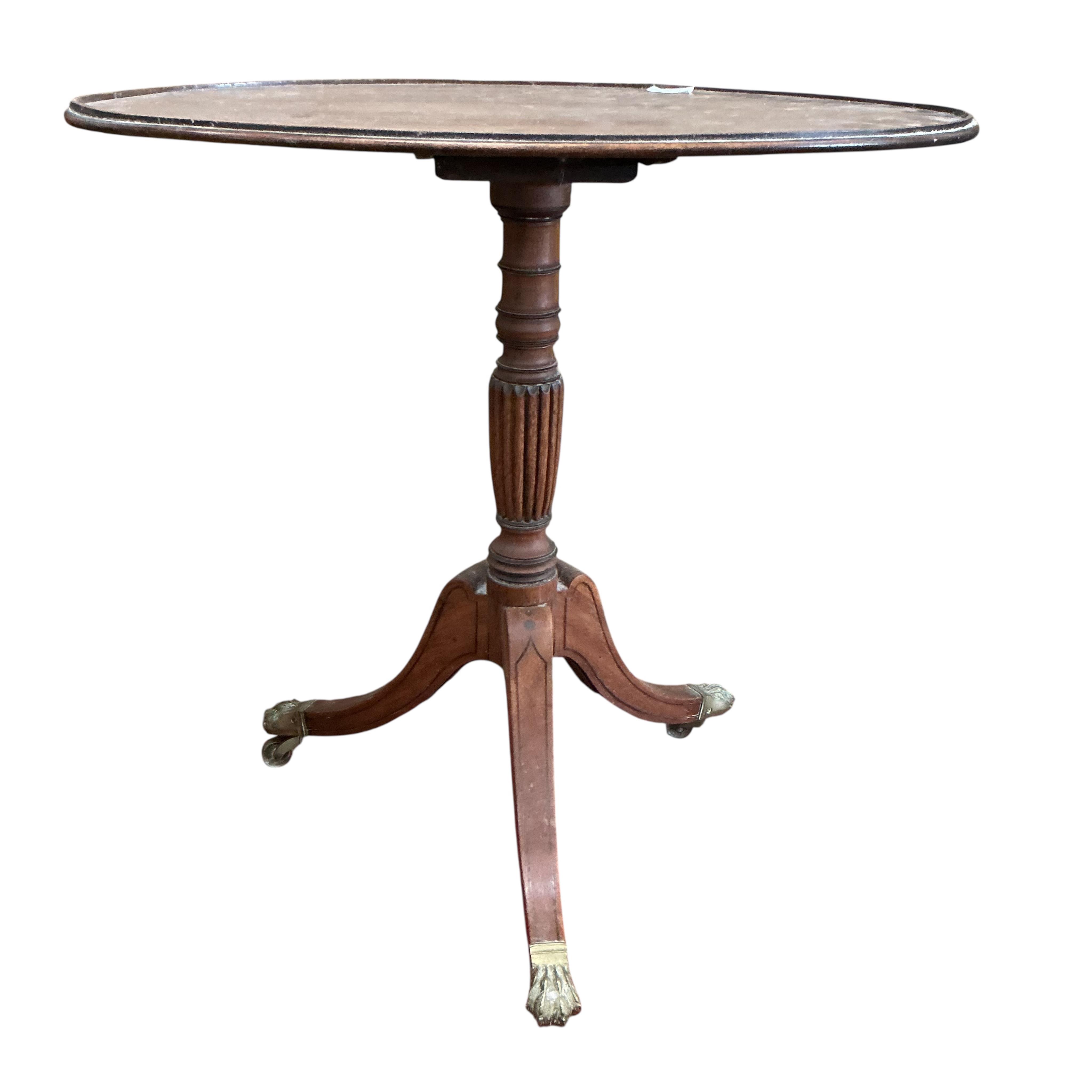 A Regency oval mahogany tripod wine table, width 70cm, depth 49cm, height 72cm